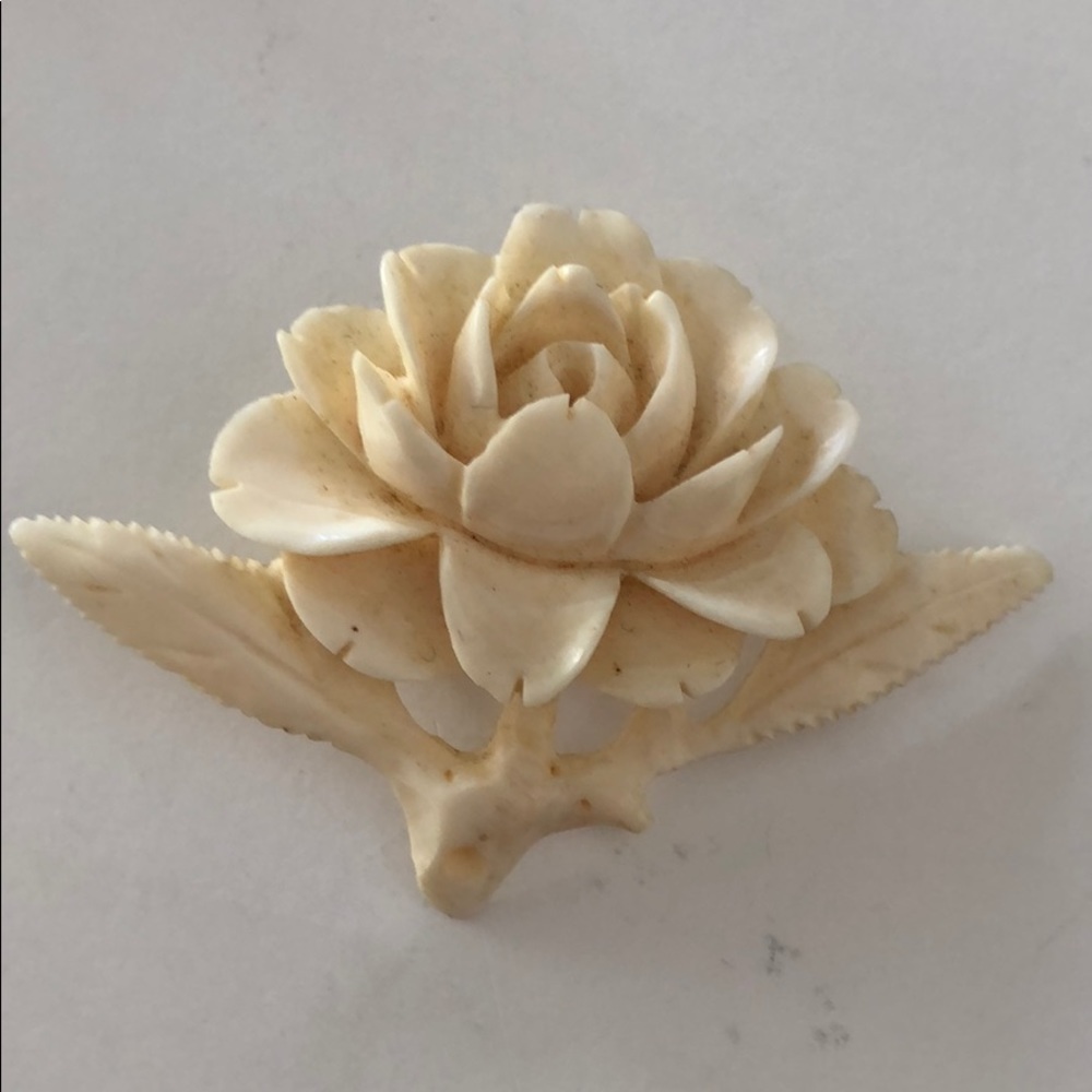 Antique carved rose made into brooch